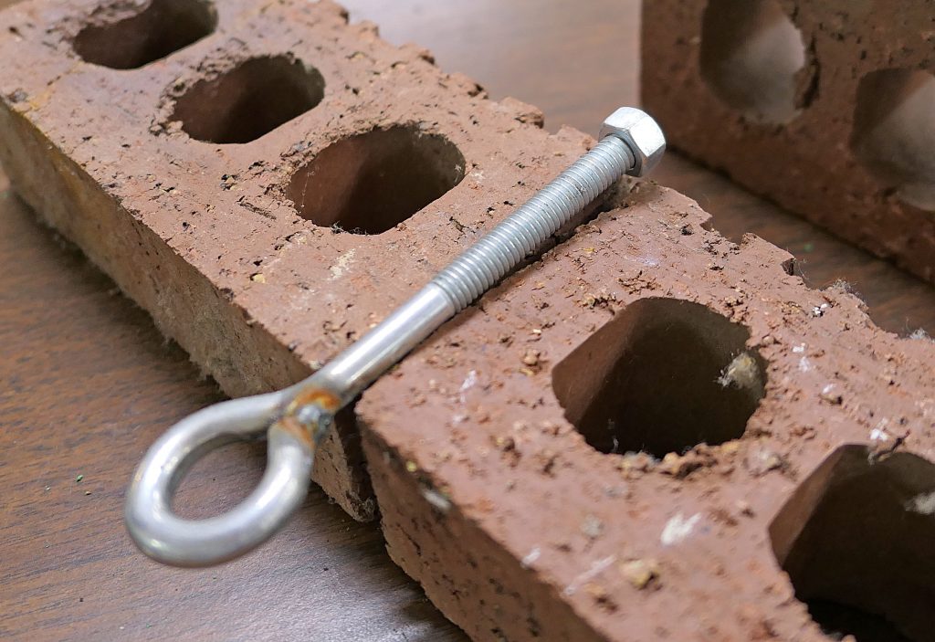 Wall Tie-In Bracket System for Non-Stop crank-up scaffolding